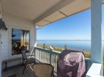 The back porch is a great place to barbecue while enjoying the beach views